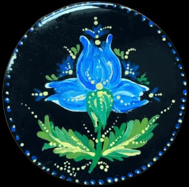 Petrykivka folk art. Blue flower with the green leaves on the black background