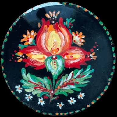 Petrykivka folk art. Red flower with the green leaves on the black background